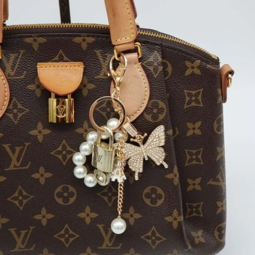 Authentic Louis Vuitton Gold Lock 🔒 Keychain Bag Unbranded Butterfly Charm LV